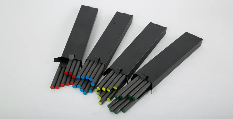 Some carbon light therapy rods are placed on the desk.